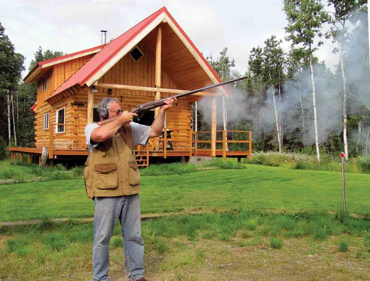Cal firing a 4-bore single shotgun during one of the shoots held at his home.